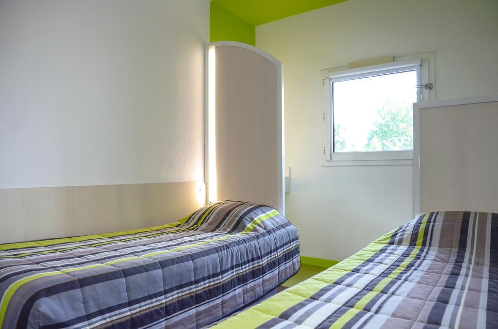 Enzo Hotel 1Er Prix Coudes Exterior photo